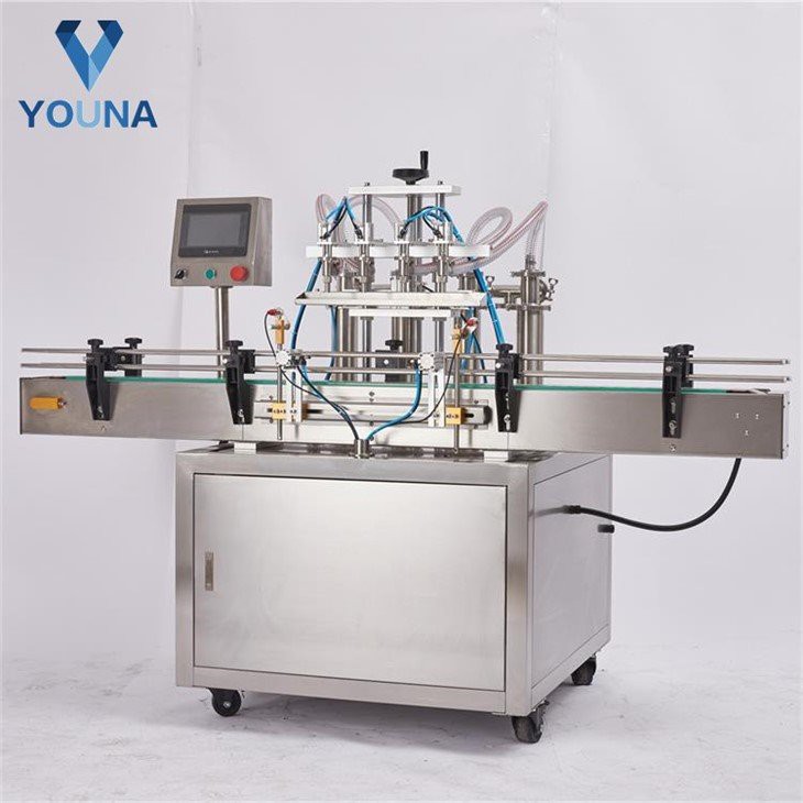 automatic 4 nozzle bottle filling machine (2)